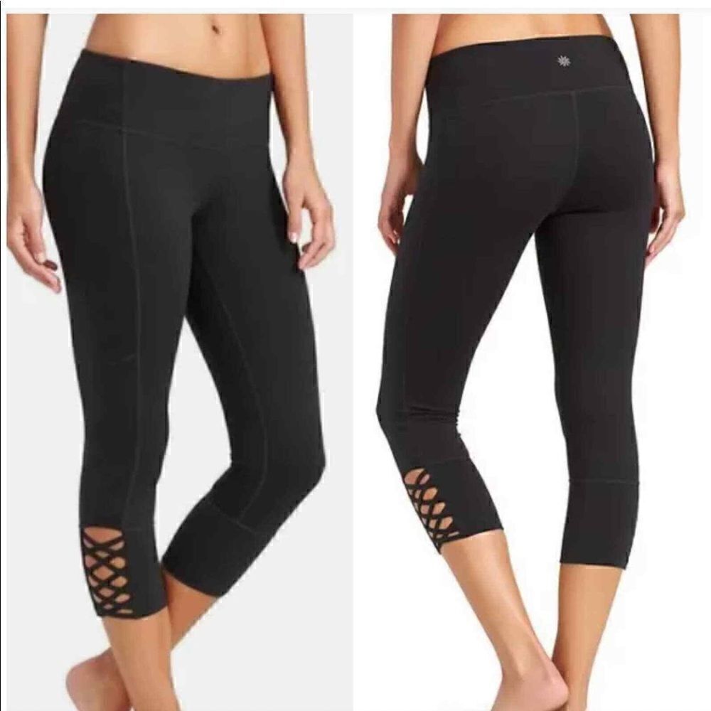 Athleta mid-rise cropped leggings with crisscross design on side